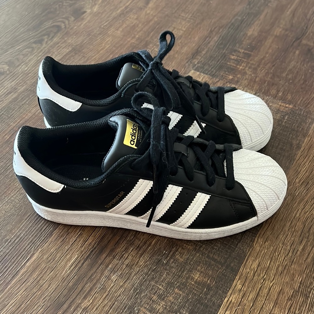 Adidas Superstar in black and white